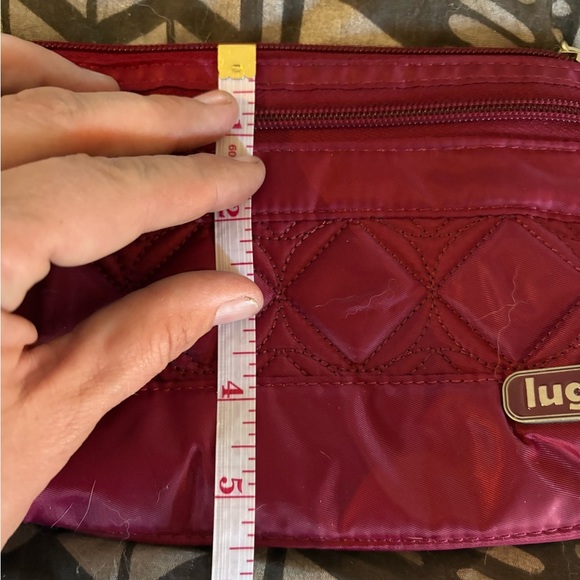 Lug Red Quilted Wristlet Clutch with waterproof interior. - Picture 5 of 5